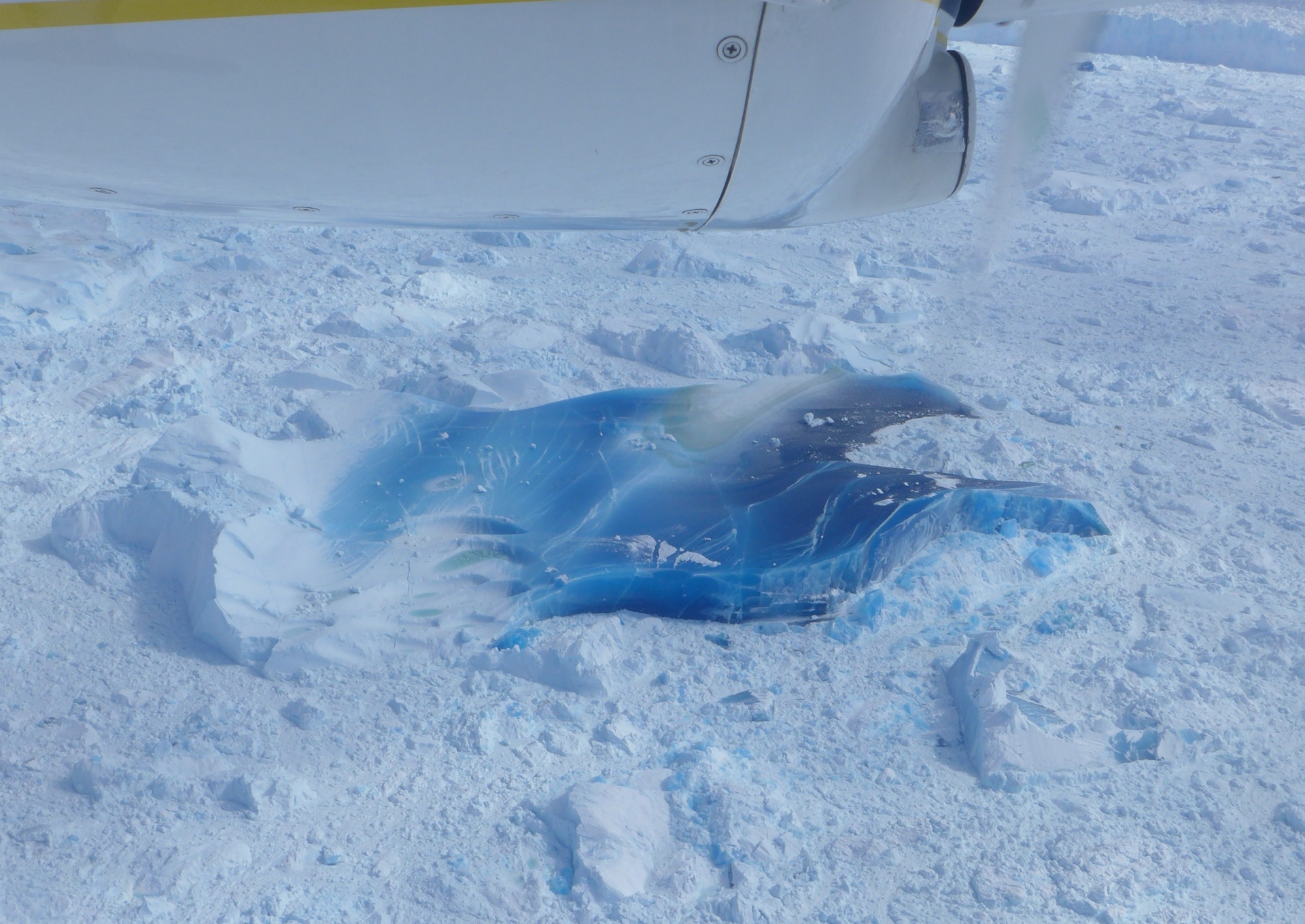A blue iceberg in the Ilulissat icefjord, Greenland